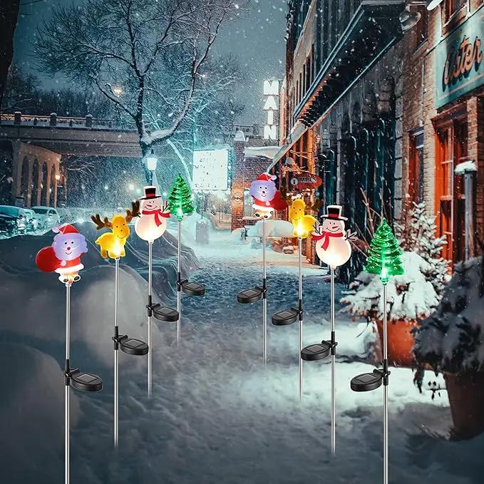 Glintoper 4 Pack Solar Christmas Figurine Lights, Outdoor Lighted Decorative Santa Claus, Snowman, Xmas Tree & Reindeer with Garden Stakes, Warm White LED Lighting Yard Stake for Path Lawn Patio Decor by GreenHaven Gardens