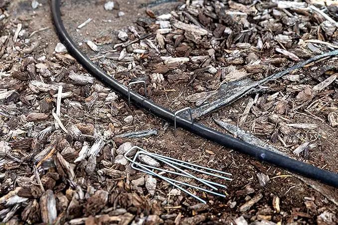 Squirrel Products U Shape Garden Stakes Metal, 6 Inch Landscaping Staples, 11 Gauge Stakes for Landscaping Fabric, 2.9mm 15x2.5x15cm – 50 Pack by GreenHaven Gardens
