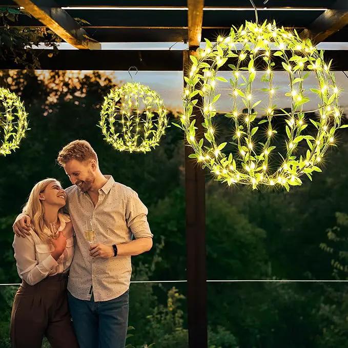 Solar Powered Hanging Iron Sphere Lights with Artificial Greenery – 12Inch 120 LED Waterproof Outdoor Decor Ball Light with Timer & 8 Modes – 2 Pack for Garden, Christmas, Weddings (Warm White) by GreenHaven Gardens