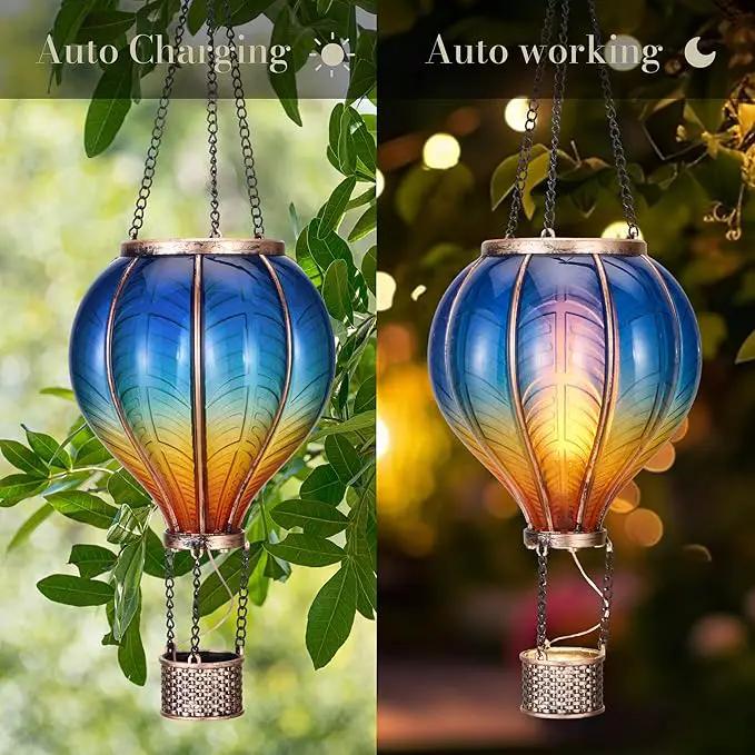TERESA'S COLLECTIONS Hot Air Balloon Solar Lantern for Garden Decor ,Flickering Flame Hanging Solar Light for Outdoor ,Blue & Yellow Plastic Lamp for Yard Tree Gift for Mom by GreenHaven Gardens