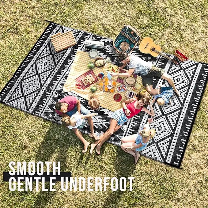 OLANLY Outdoor Rug Waterproof 10x14 ft, Reversible Outdoor Plastic Straw Rug, Boho Patio Rug, Indoor Outdoor Carpet, RV Mat Outside for Patio, Camp, Picnic, Balcony, Deck, Backyard, Black & White by GreenHaven Gardens