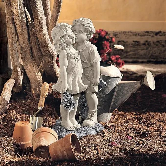 Young Sweethearts: Kissing Children Garden Statue by GreenHaven Gardens