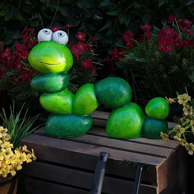 Alpine Corporation YEN608SLR Caterpillar Statue with Light Up Eyes, Solar Powered LED Caterpillar Garden Statue, 16" H, Green by GreenHaven Gardens