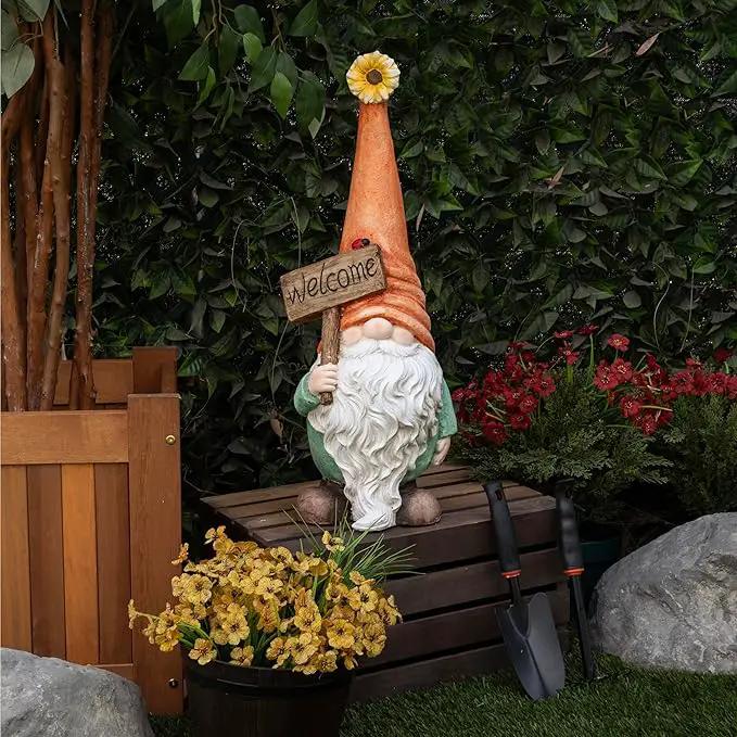Alpine Corporation MCC848 Indoor/Outdoor Gnome with "Welcome" Sign Garden Statue, Charming Gnome with Hat, 26"H, Orange by GreenHaven Gardens