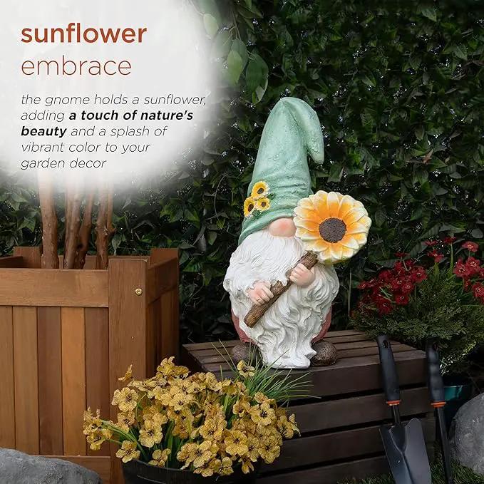 Alpine Corporation MCC842 Indoor/Outdoor Gnome Holding Sunflower Garden Statue, Charming Gnome Statue w/Hat, 21" H, Turquoise by GreenHaven Gardens