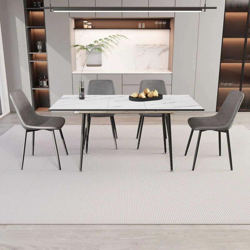 Modern Extendable Dining Table And Chair Set by HouseOfZazla