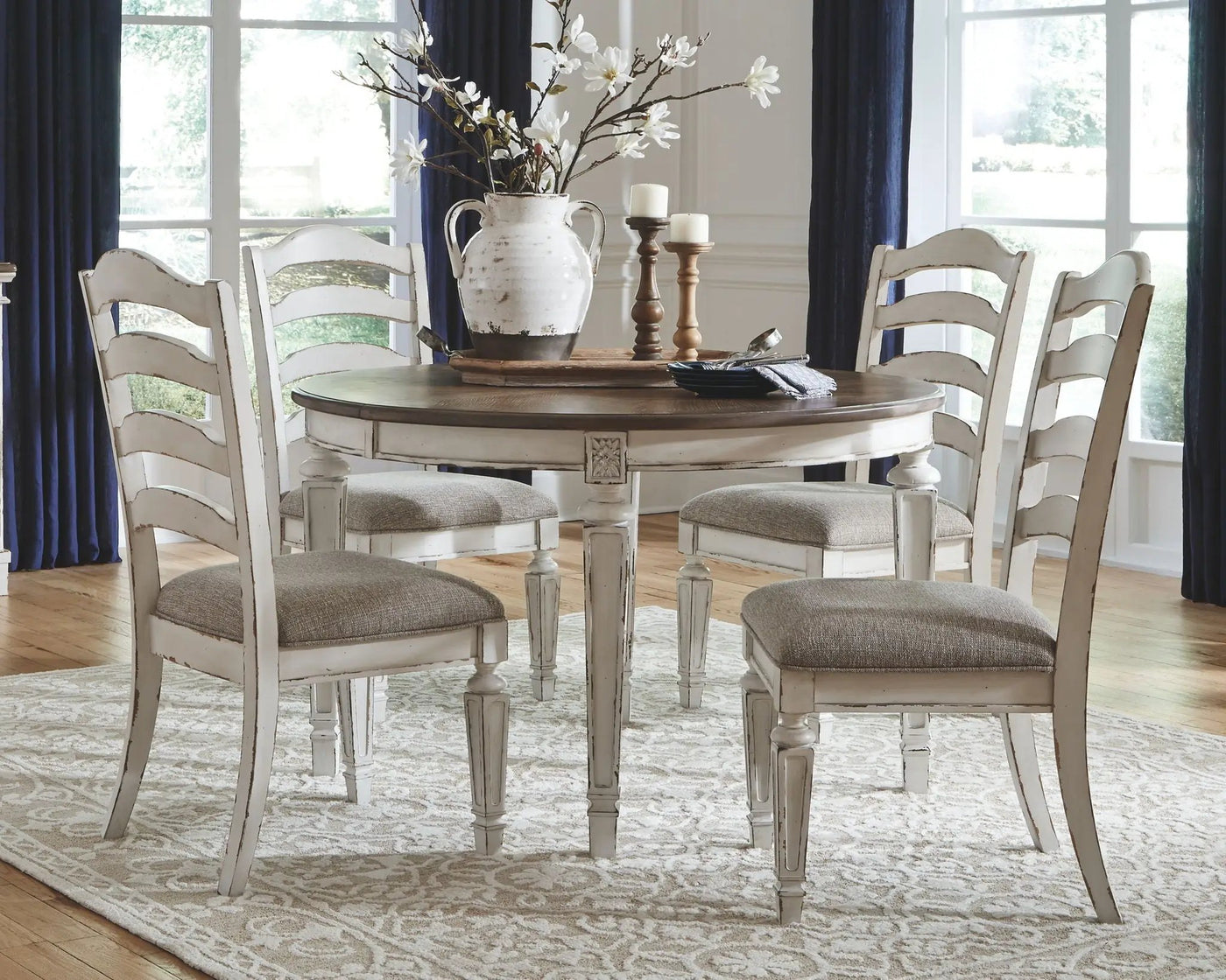 Realyn - Oval Dining Table Set by Unique Piece Furniture