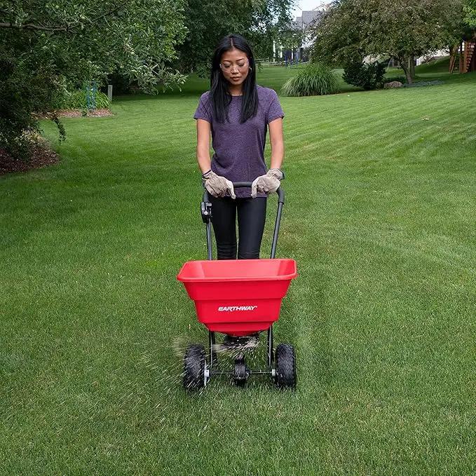 EarthWay 2050P 80lb Broadcast Spreader, Lawn Aerator, Fertilizer Spreader, 80lb Capacity, Pre-Assembled, with Rustproof Poly Hopper and Adjustable Drop Rate for Lawn Care & Seed Spreading by GreenHaven Gardens