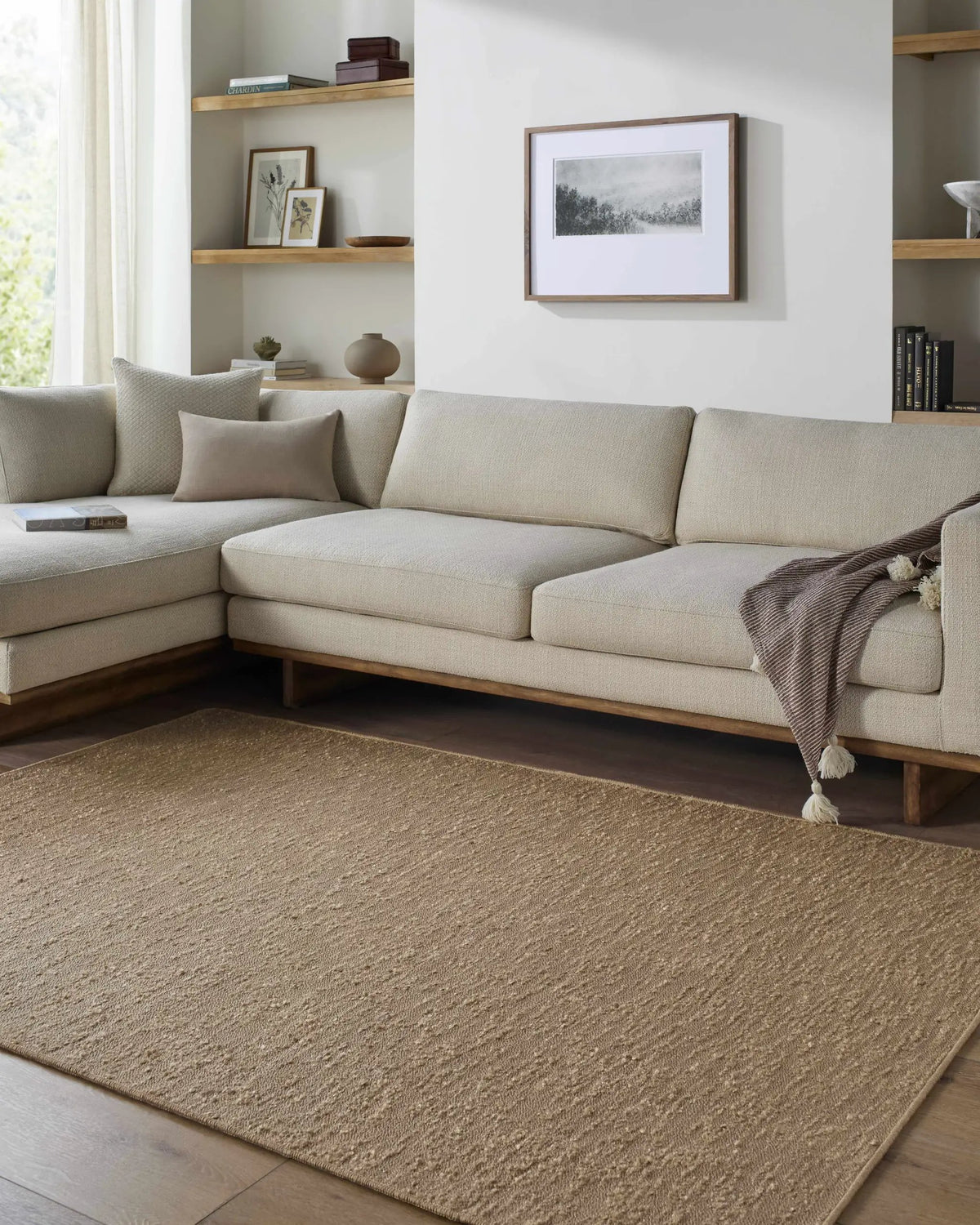 Breena Sandstone Washable Area Rug, installed in a room