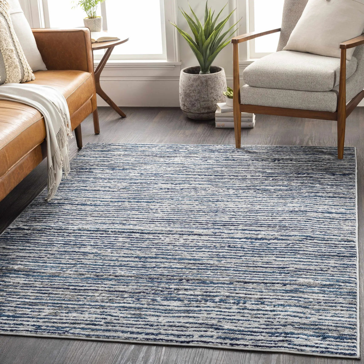 Bowmansdale Striped Navy Rug, installed in a room