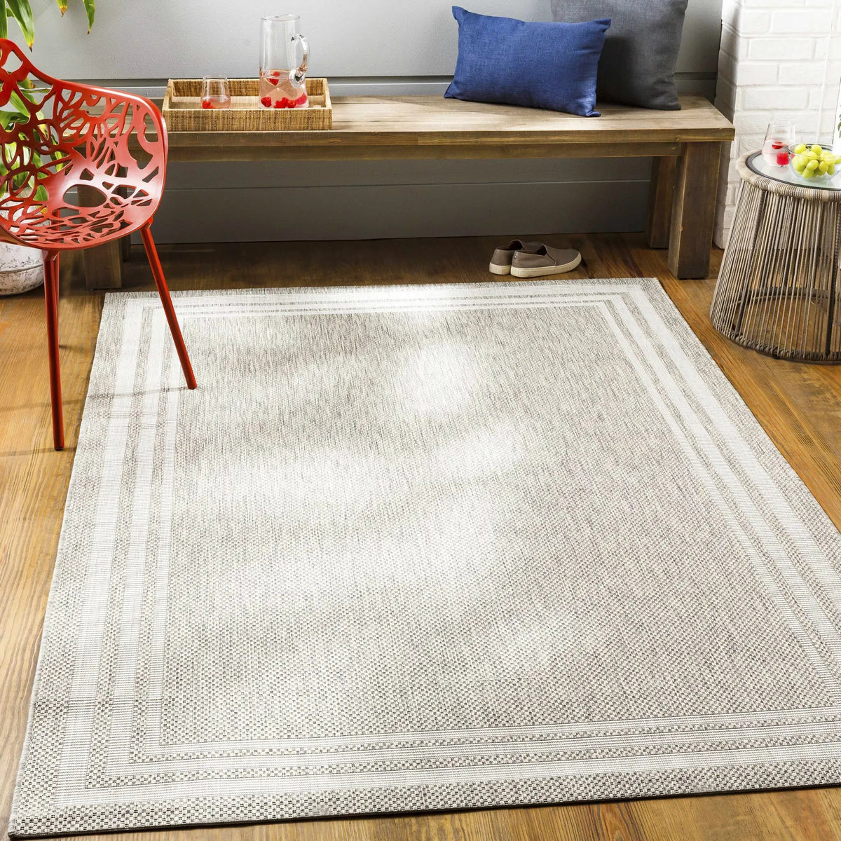 Burradoo Bordered Outdoor Area Rug, installed in a room 2