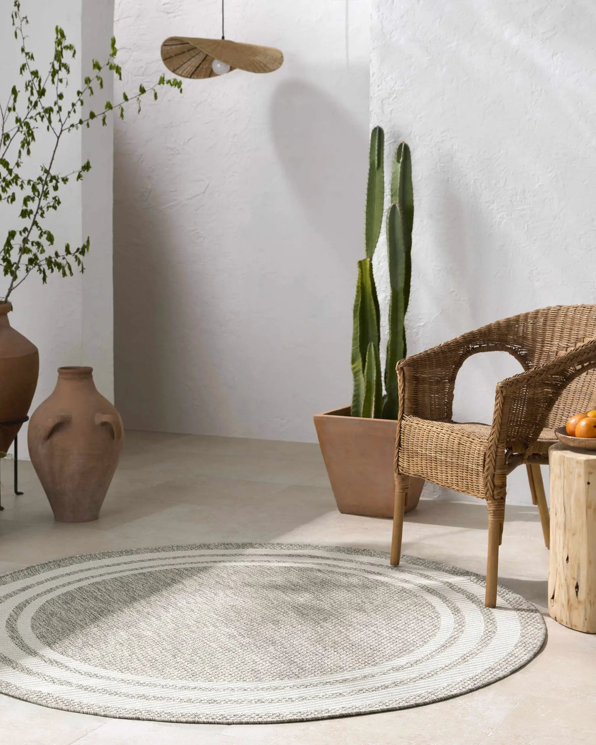 Burradoo Bordered Outdoor Area Rug, installed in a room