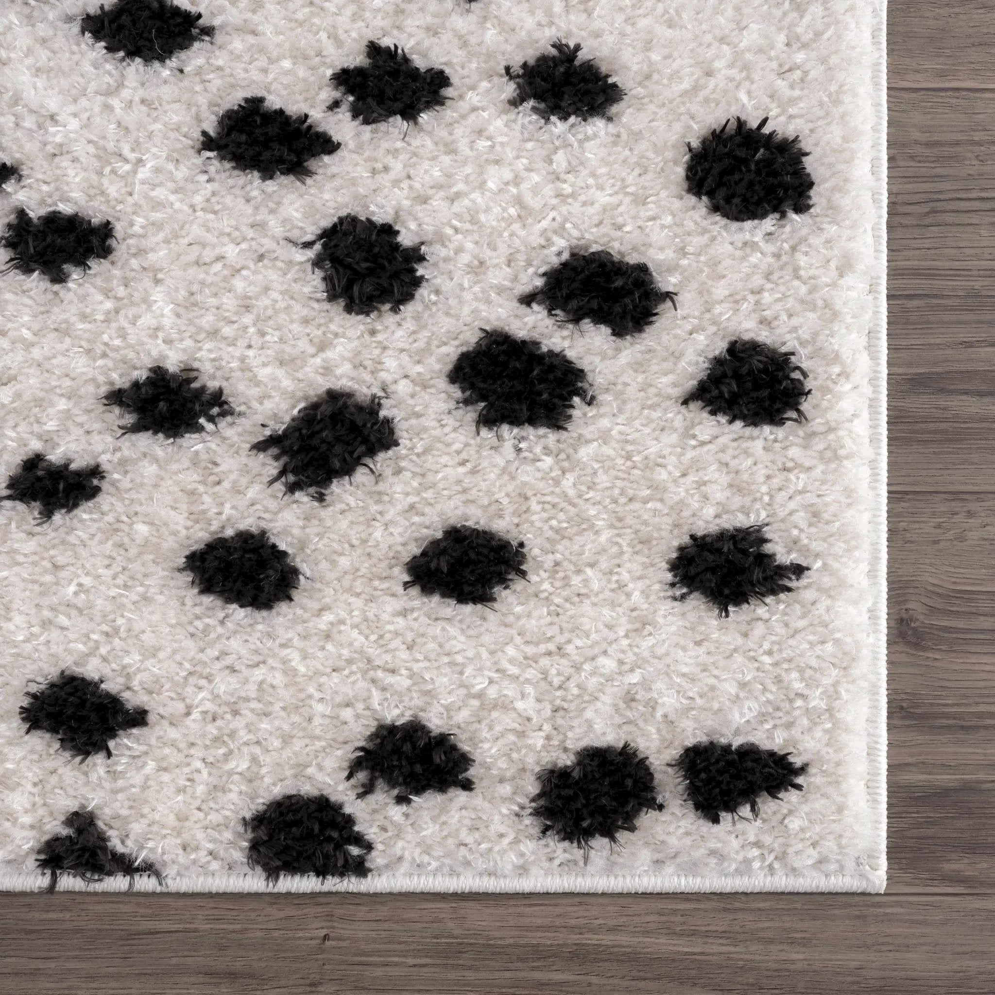 Cansu Black & White Dotted Area Rug by Hauteloom