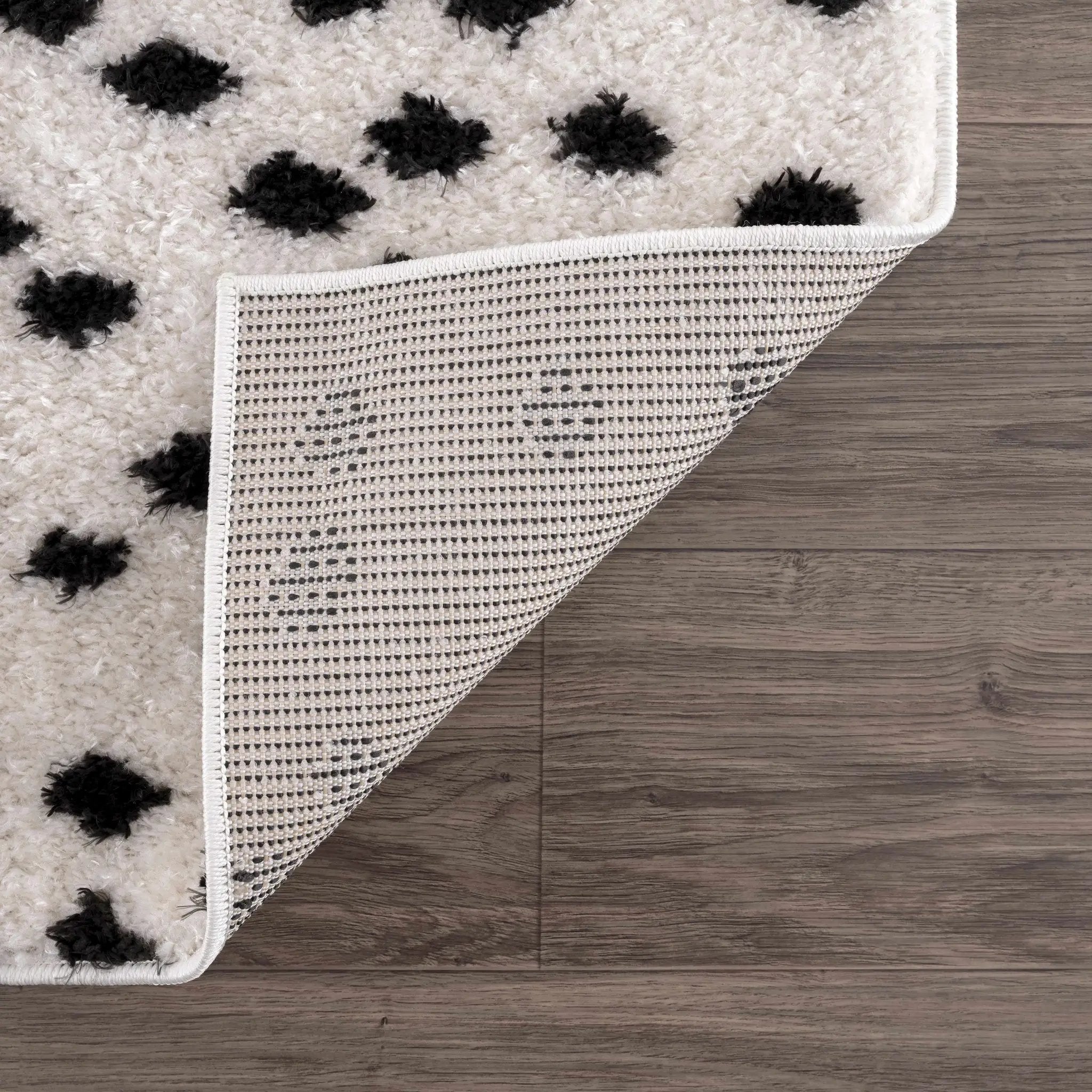 Cansu Black & White Dotted Area Rug by Hauteloom