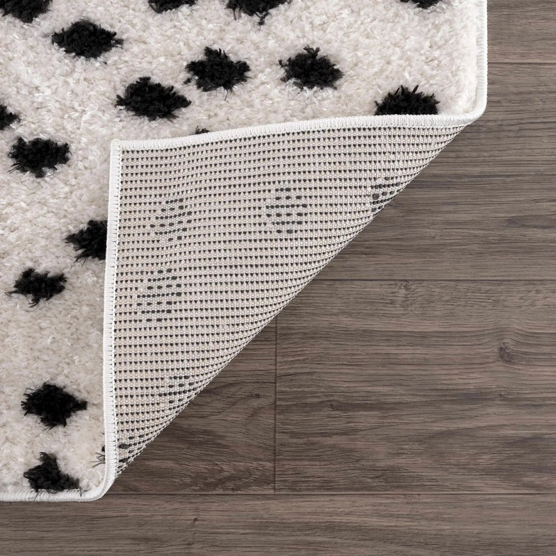 Cansu Black & White Dotted Area Rug by Hauteloom