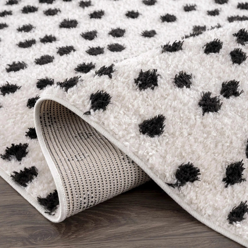 Cansu Black & White Dotted Area Rug by Hauteloom