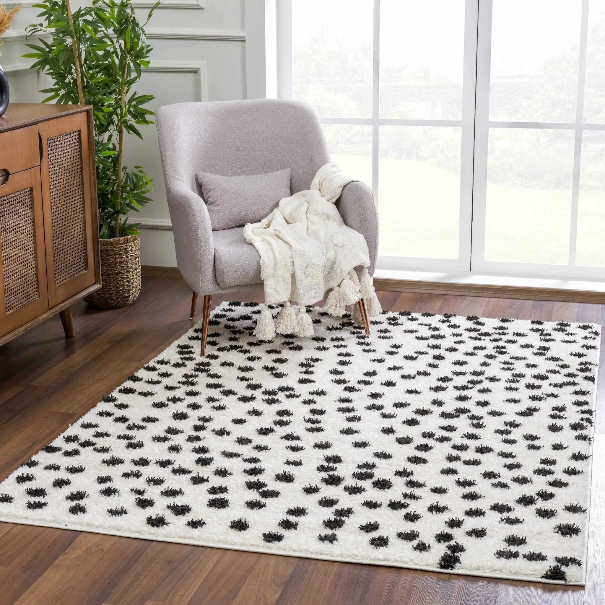 Cansu Black & White Dotted Area Rug by Hauteloom