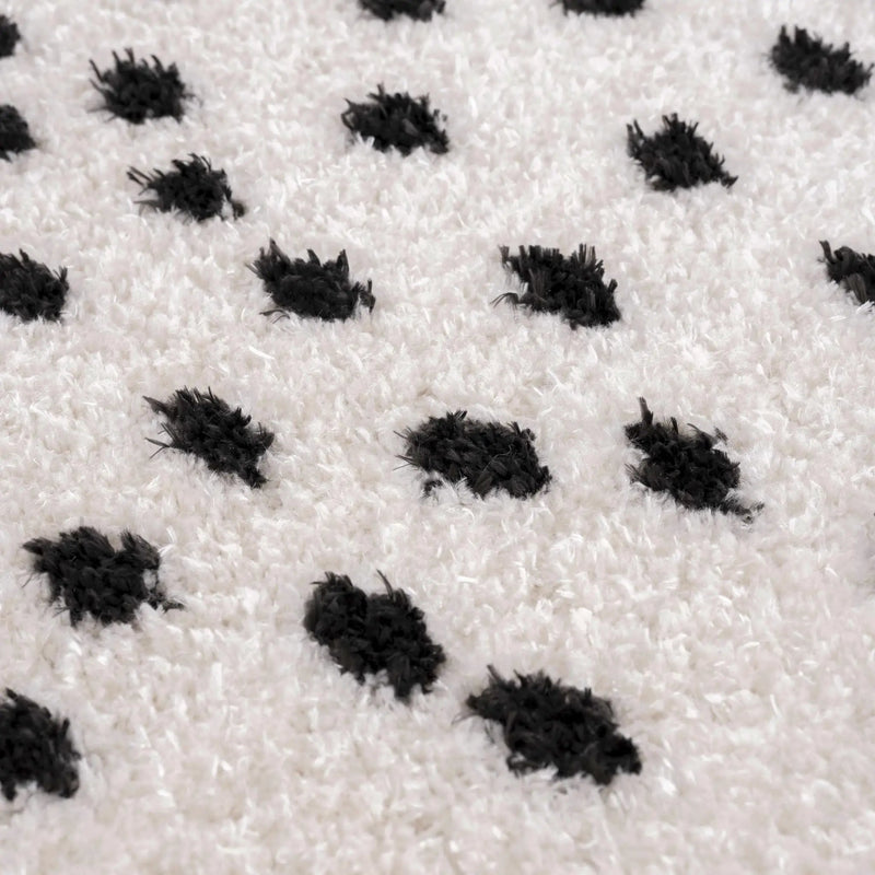 Cansu Black & White Dotted Area Rug by Hauteloom