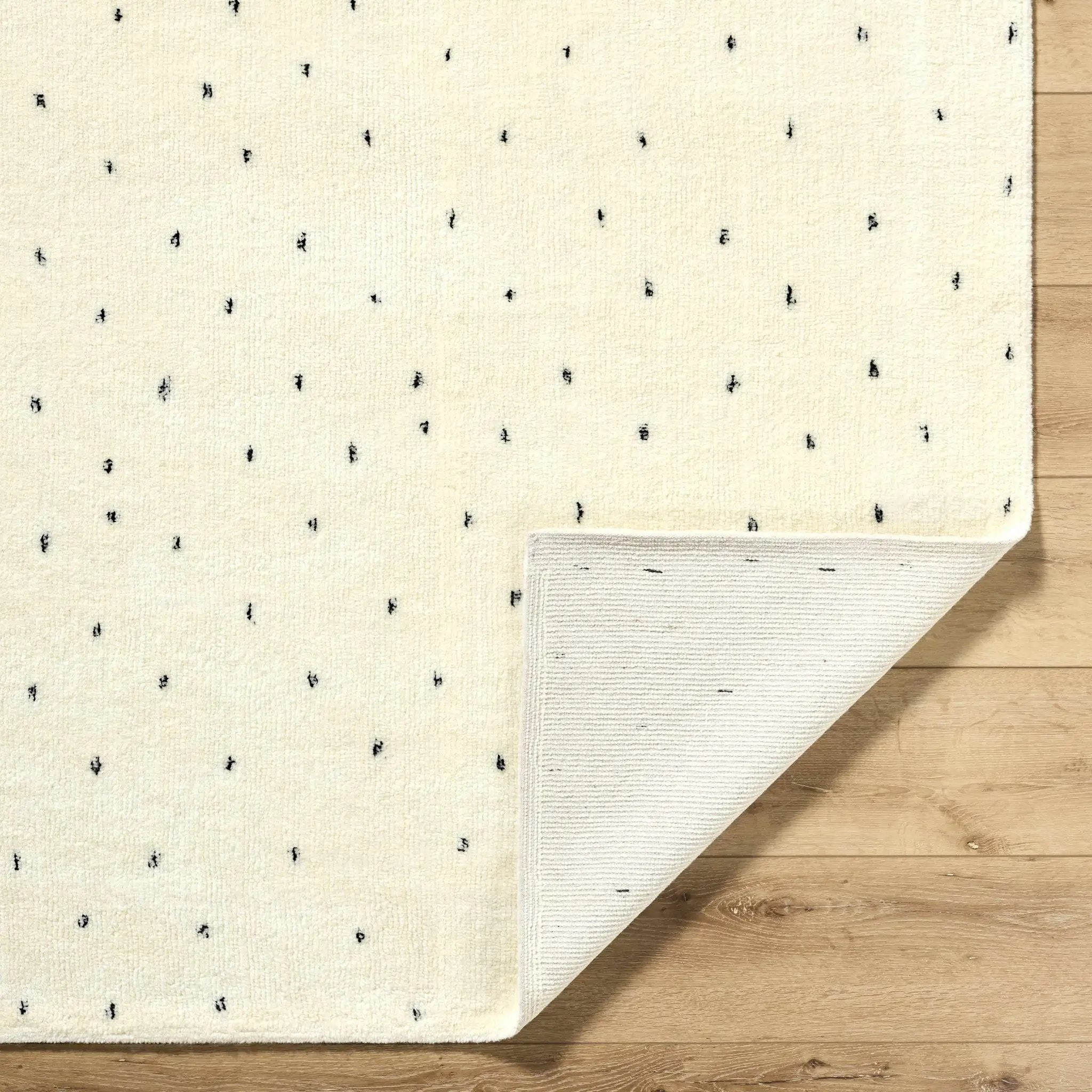 Cirila Dotted Ivory Washable Wool Rug by Boutique Rugs
