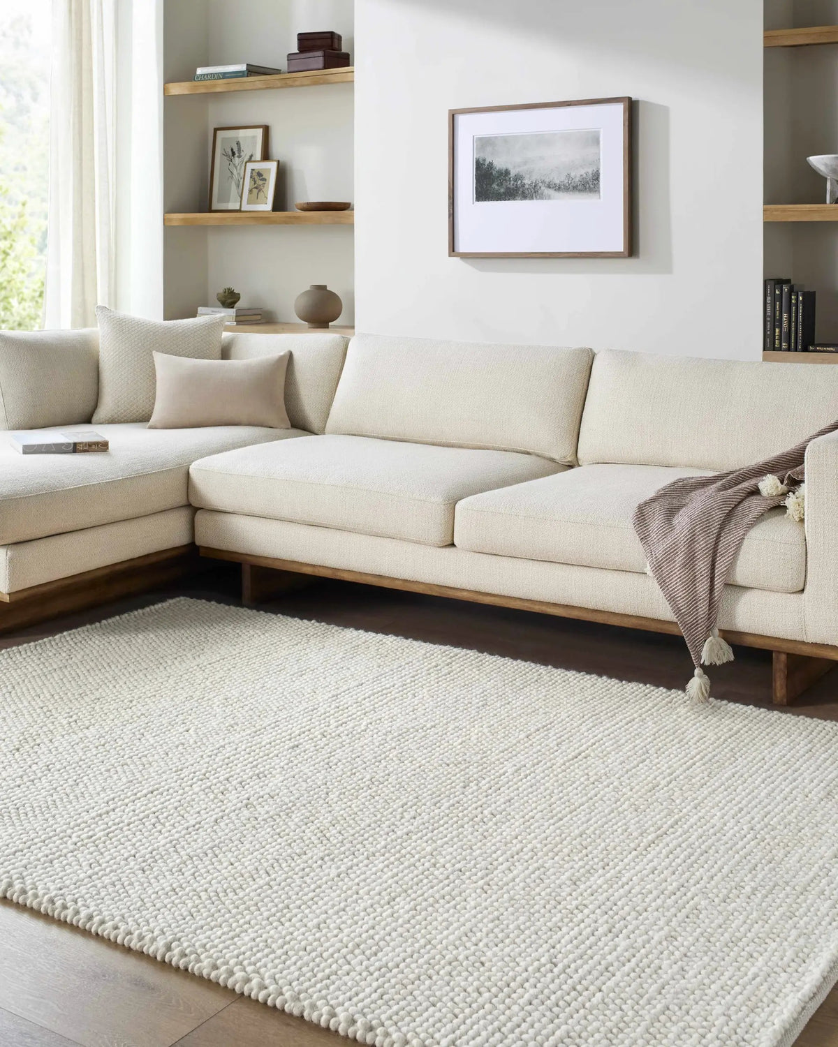 Clayne Beige Premium Wool Area Rug, installed in a room