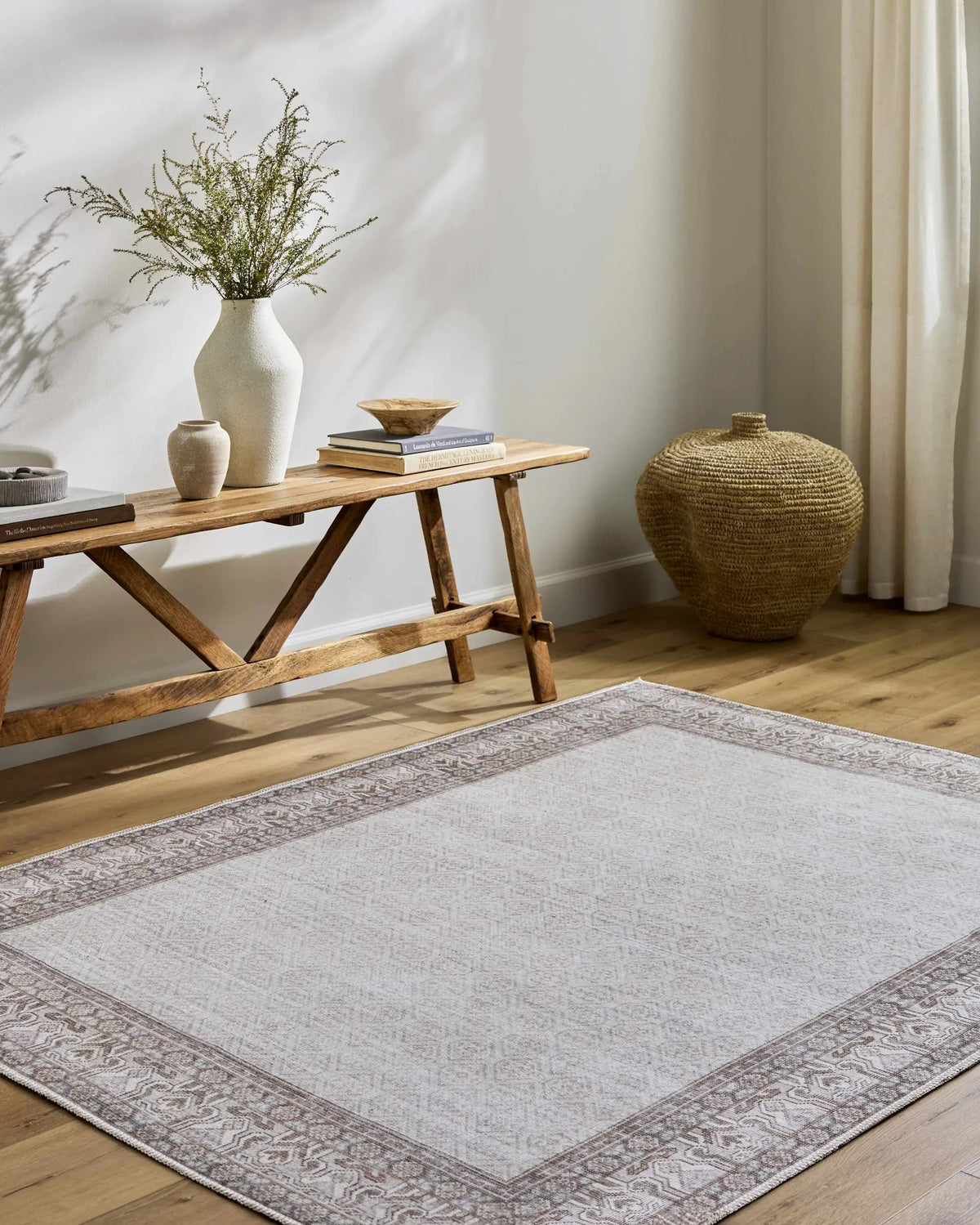Rainier Cottage Border Brown Washable Rug | Our PNW Home X Livabliss, installed in a room