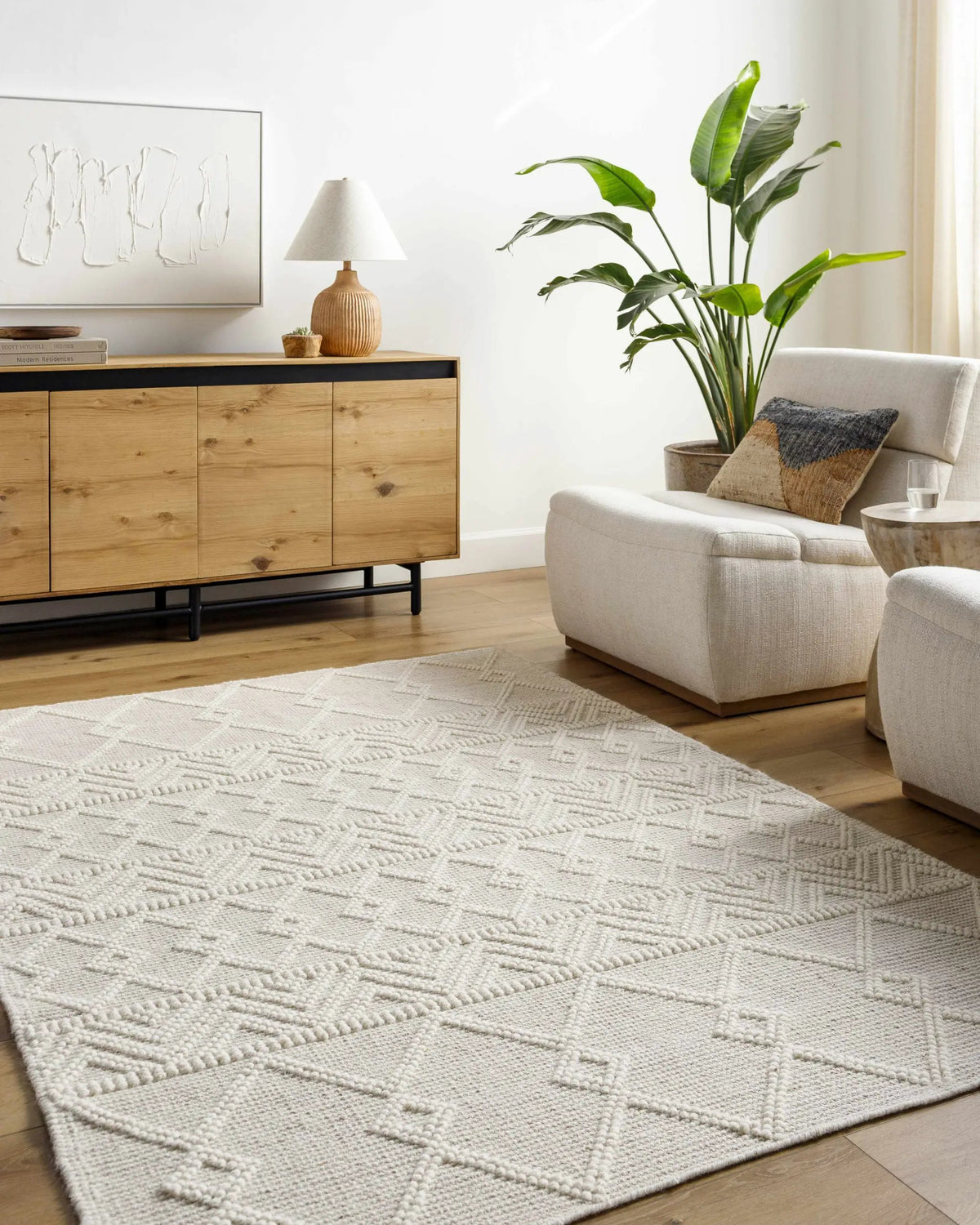 Caelum White Wool-Blend Rug, installed in a room