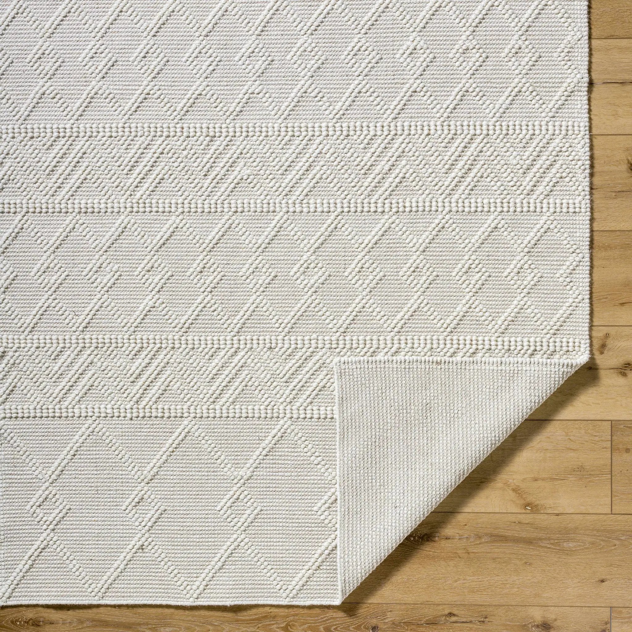 Caelum White Wool-Blend Rug by Boutique Rugs