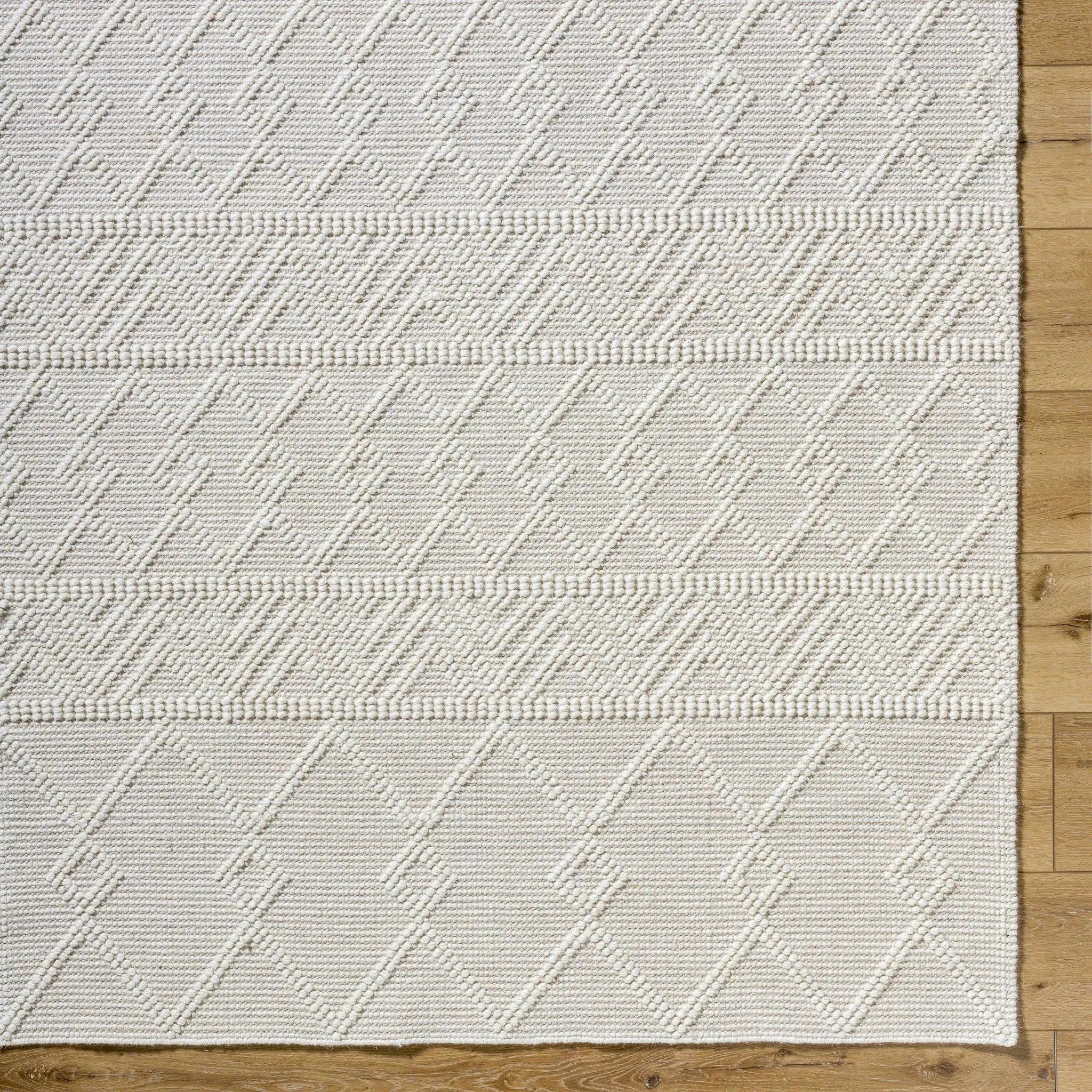 Caelum White Wool-Blend Rug by Boutique Rugs