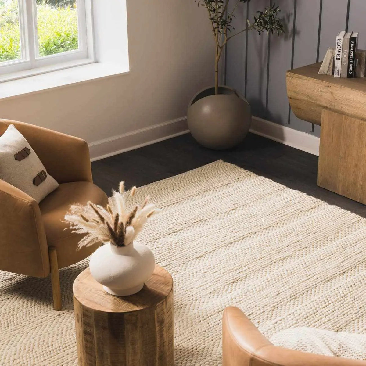 Clarke Beige Textured Wool Rug, installed in a room