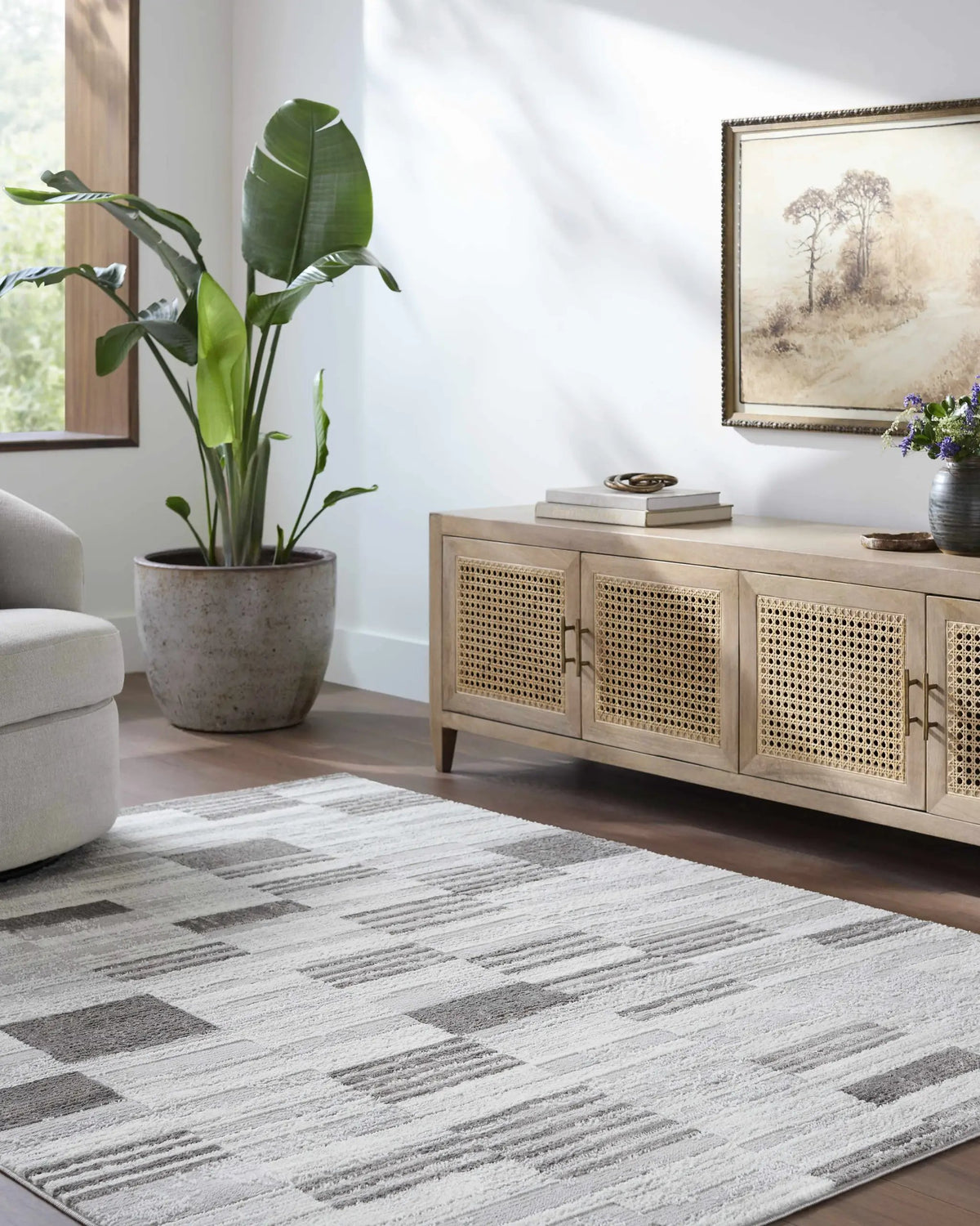 Chiaki Light Gray Area Rug, installed in a room