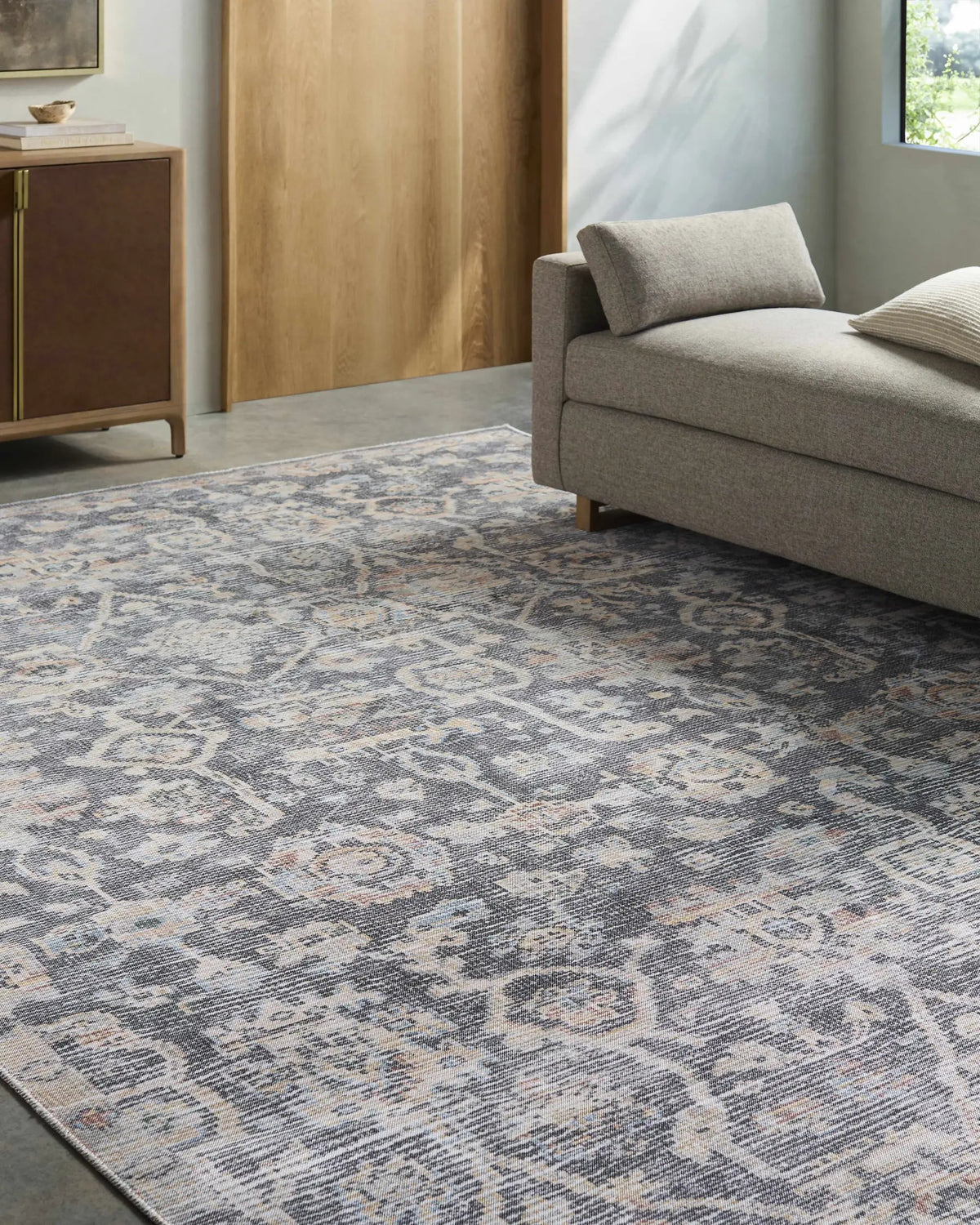 Cheick Washable Area Rug - Vivir x Livabliss, installed in a room