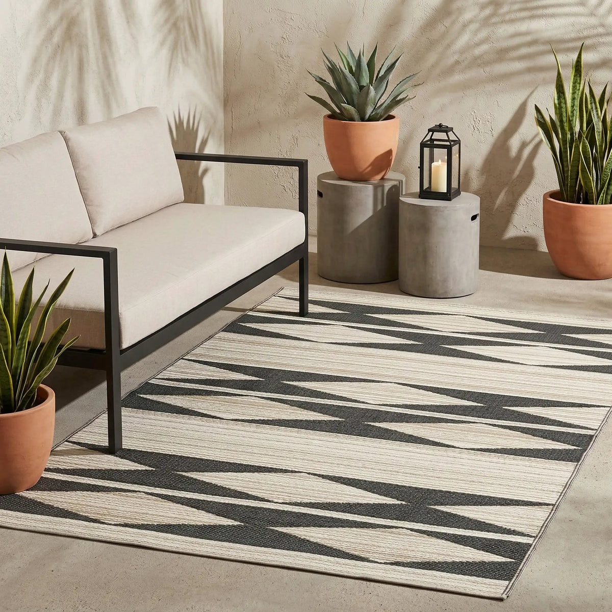 Cairo - Natural & Black Outdoor Rug for Patio, installed in a room