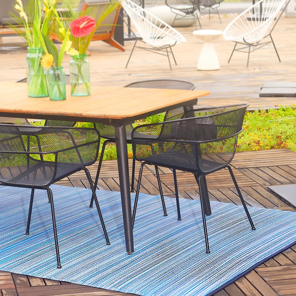 Cancun - Indigo Outdoor Rug for Patio, installed in a room