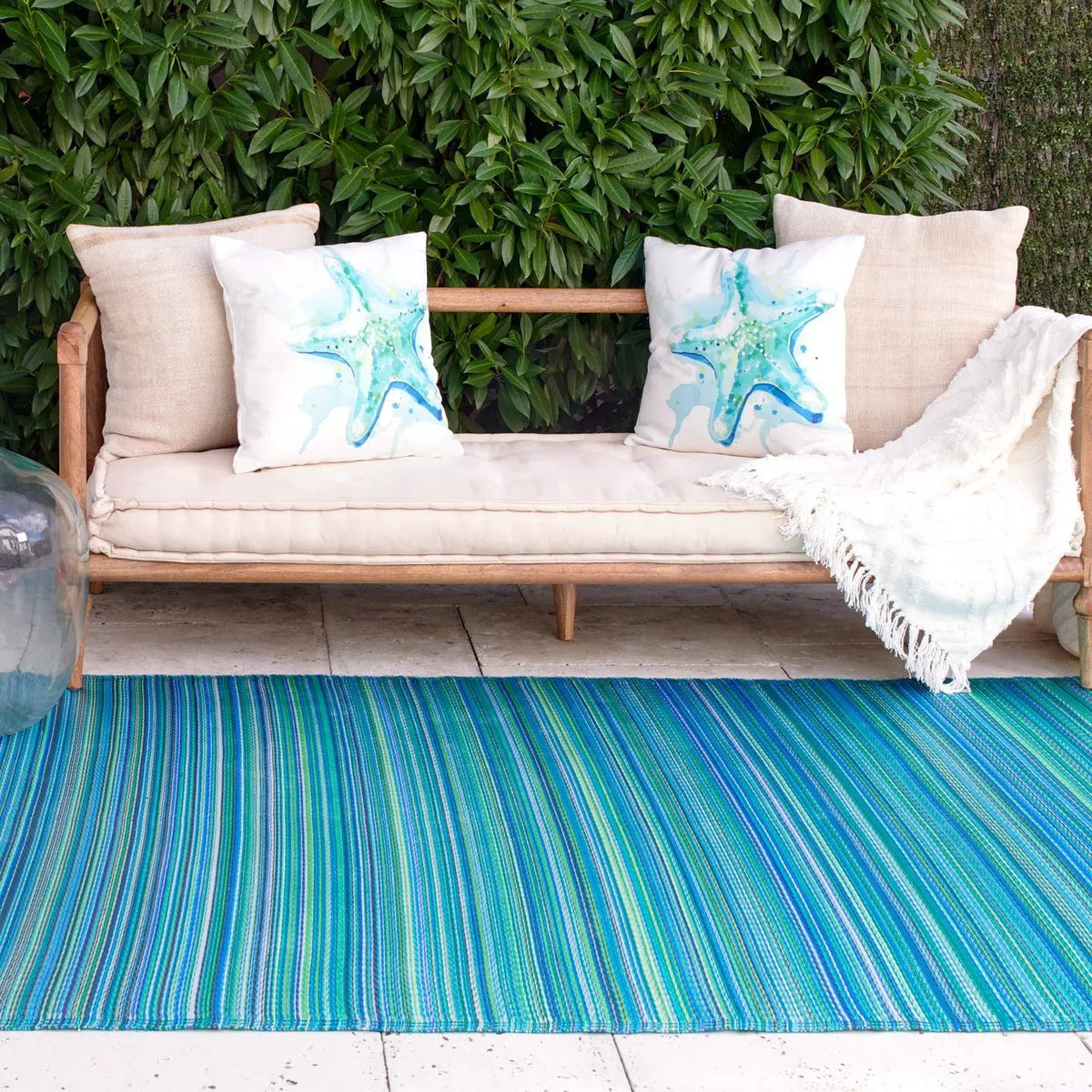 Cancun Outdoor Rug for Patio, installed in a room