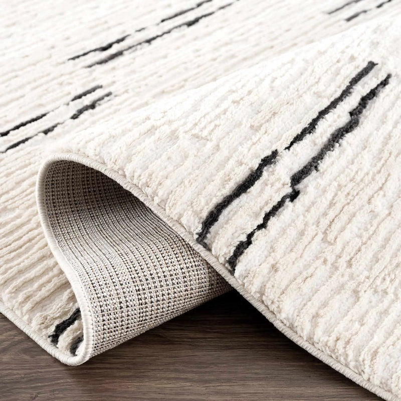 Riad Black Striped White Rug with Tassels by Boutique Rugs