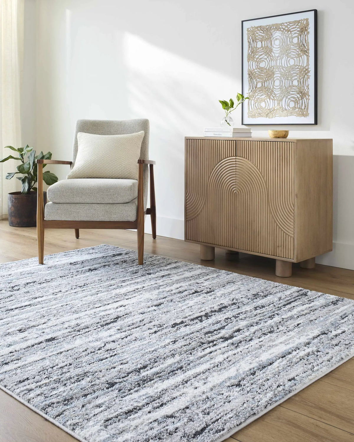 Azmina Area Rug, installed in a room