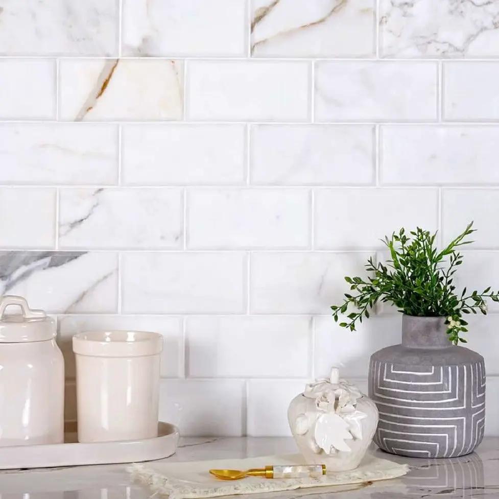 White 3x6 Polished Beveled Subway Calacatta Gold Marble Tile (40 pack, 5 sq ft/case) by Apollo Tile