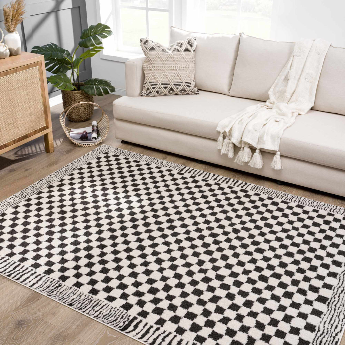Leryn Black & White Checkered Area Rug, installed in a room 4