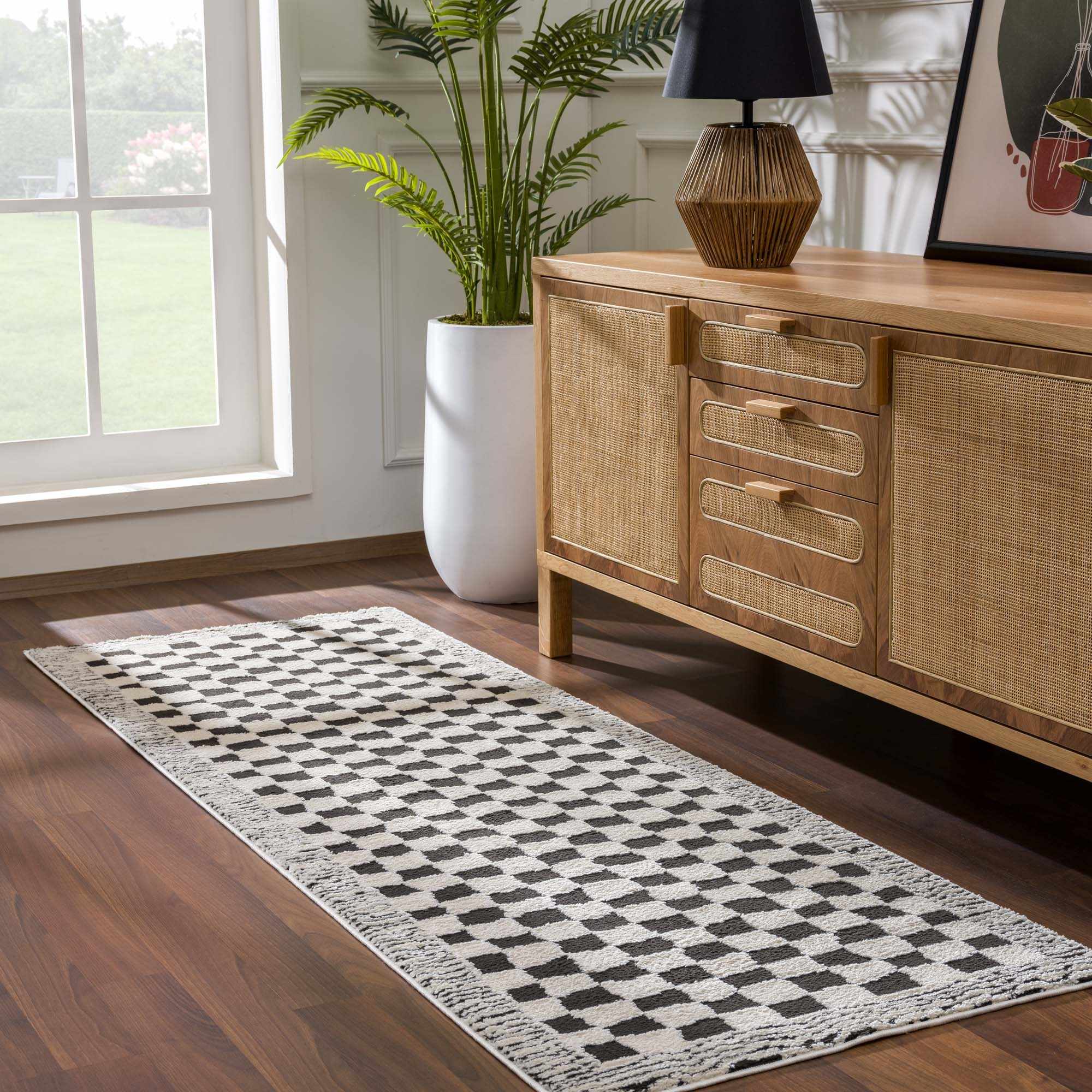 Leryn Black & White Checkered Area Rug by Hauteloom