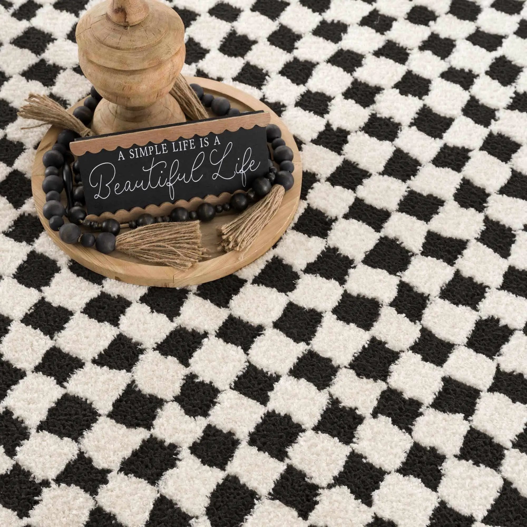 Leryn Black & White Checkered Area Rug by Hauteloom