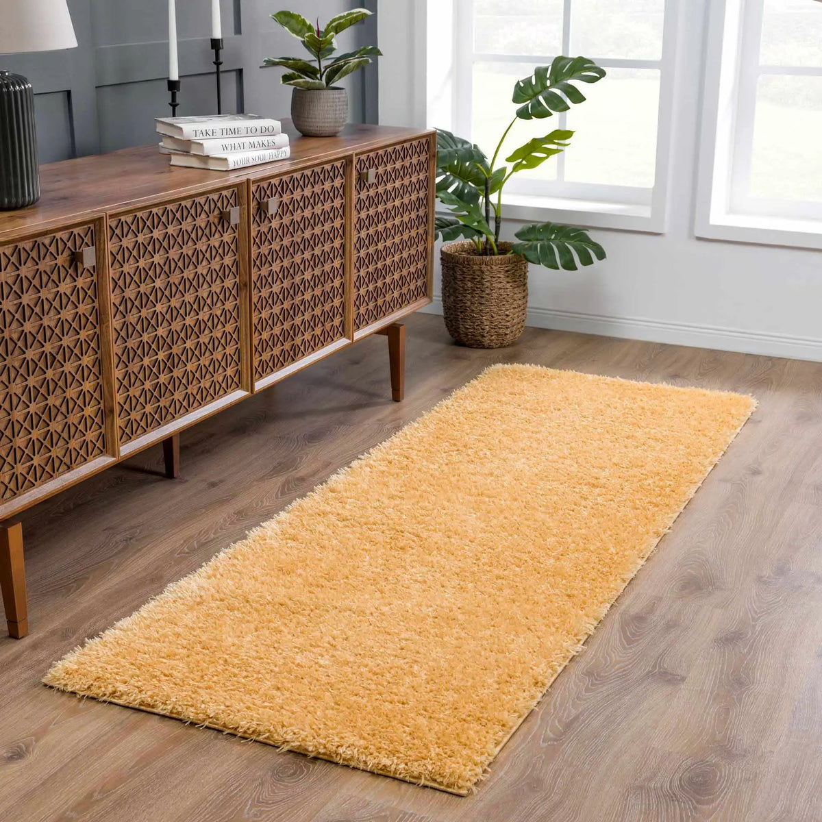 Faina Solid Gold Shag Washable Area Rug - Clearance, installed in a room 3