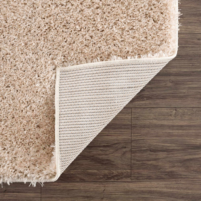 Faina Solid Beige Shag Rug Washable by Hauteloom