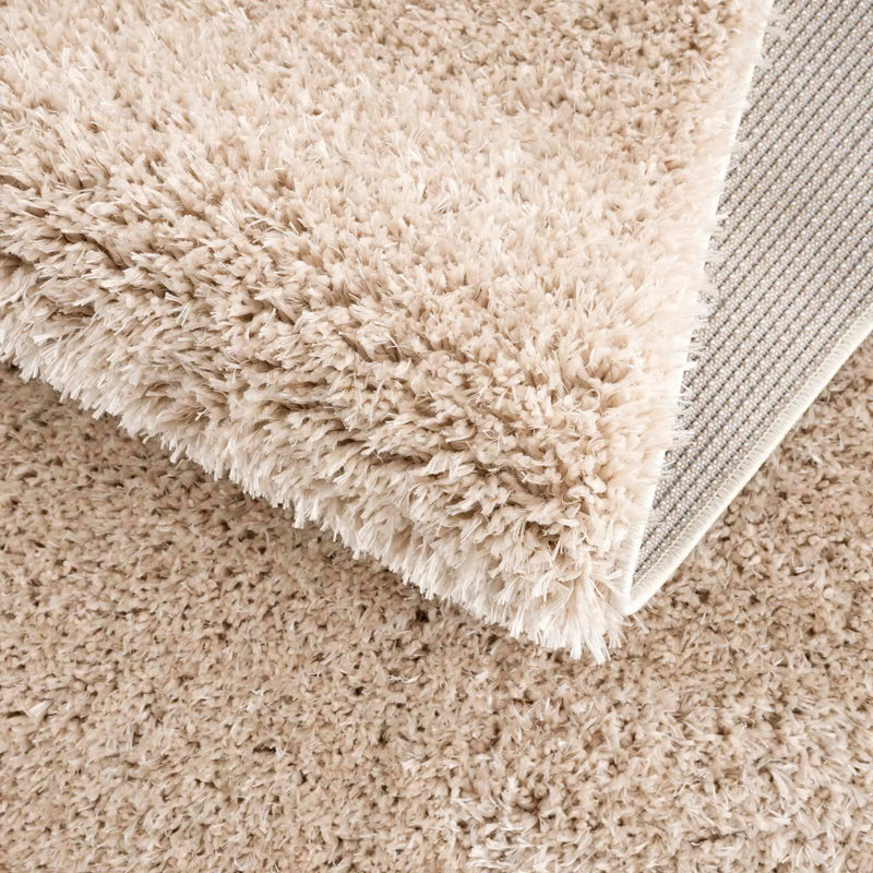 Faina Solid Beige Shag Rug Washable by Hauteloom