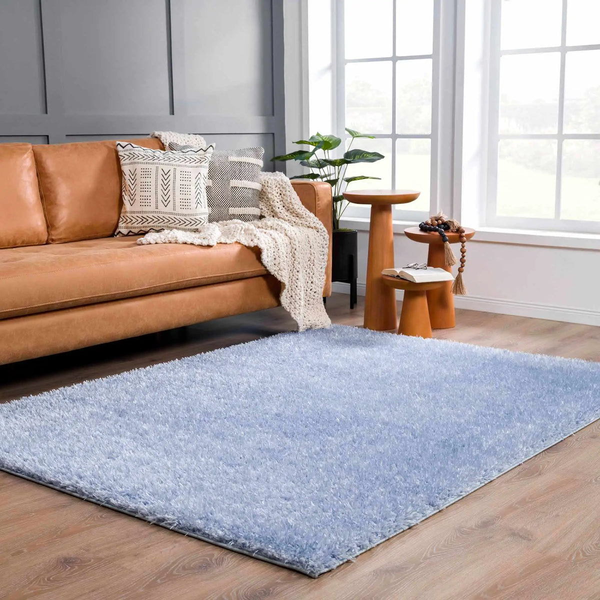 Faina Solid Aqua Shag Washable Area Rug - Clearance, installed in a room