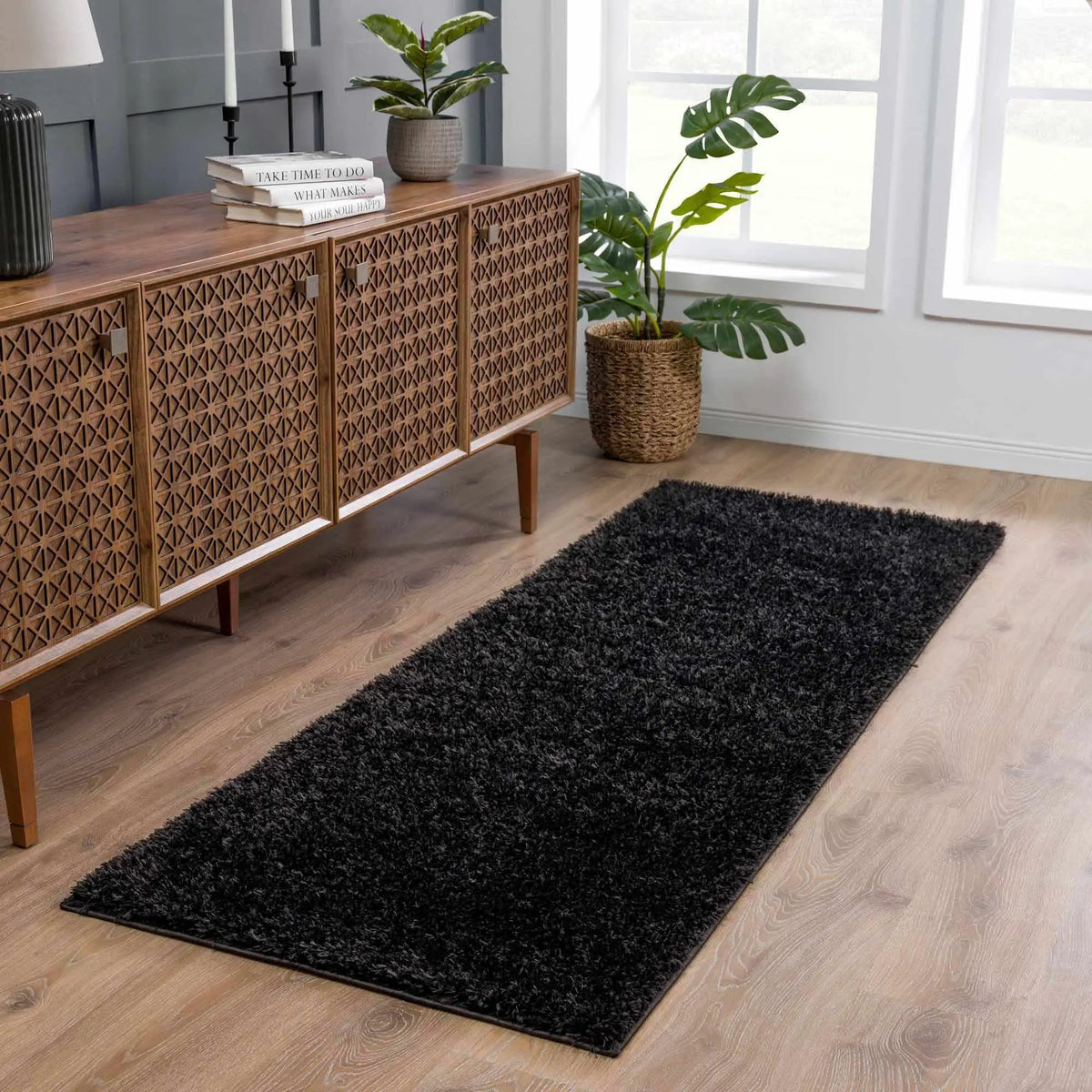 Faina Solid Black Shag Washable Area Rug - Clearance, installed in a room 3