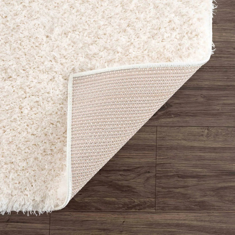 Faina Solid Cream Shag Washable Area Rug - Clearance by Boutique Rugs
