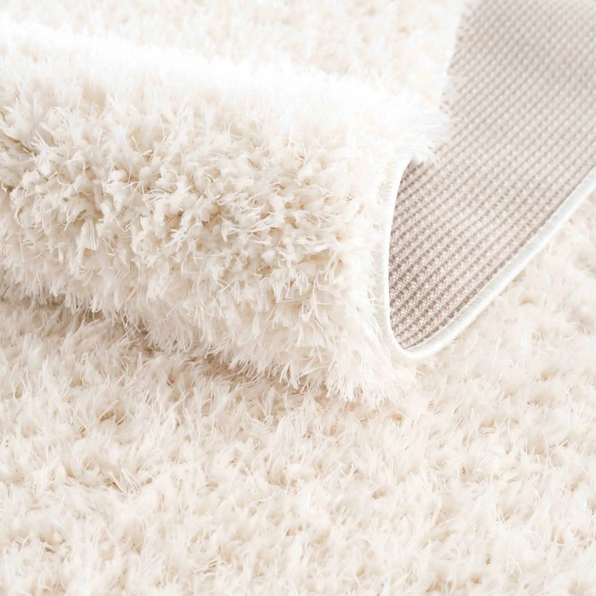Faina Solid Cream Shag Washable Area Rug - Clearance by Boutique Rugs