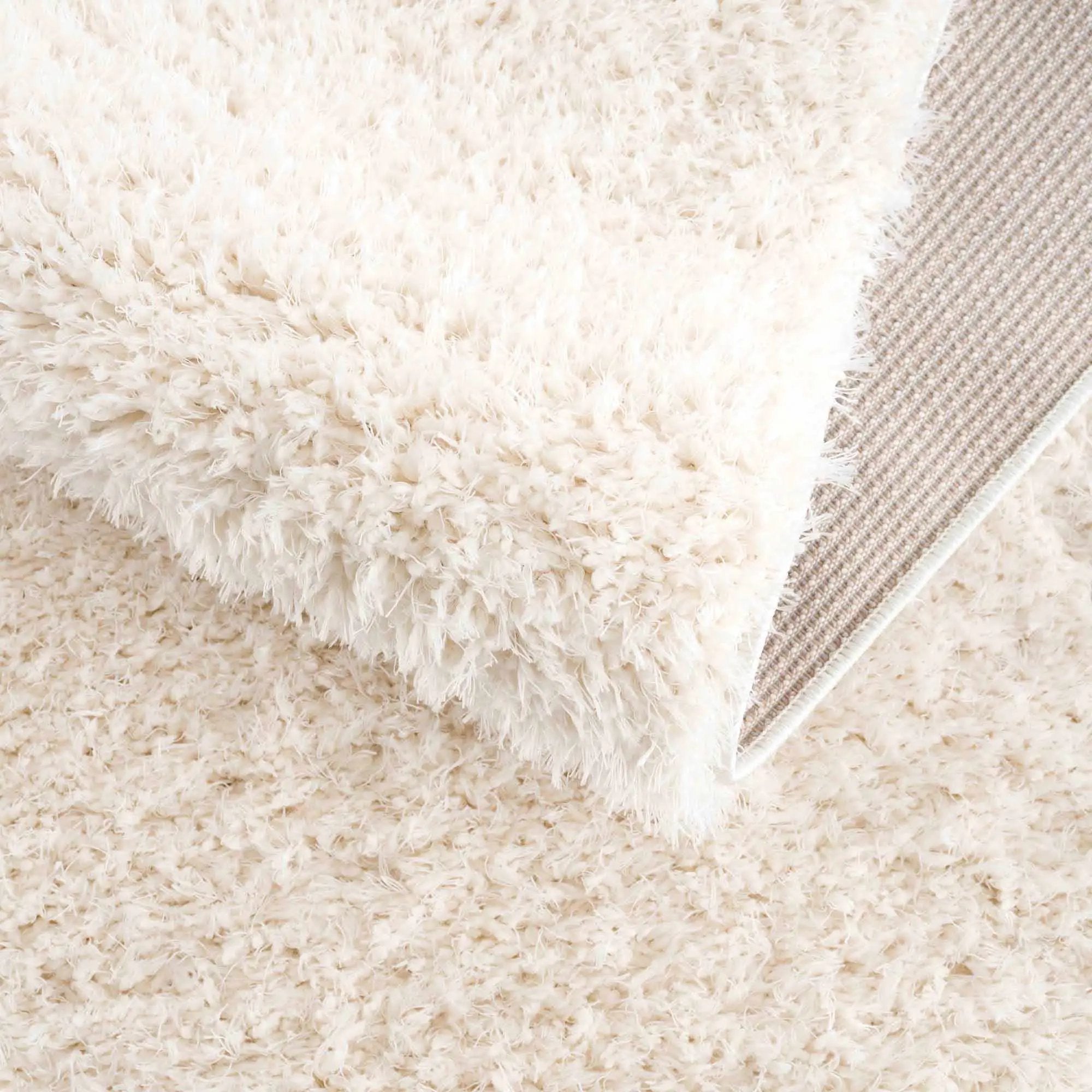Faina Solid Cream Shag Washable Area Rug - Clearance by Boutique Rugs