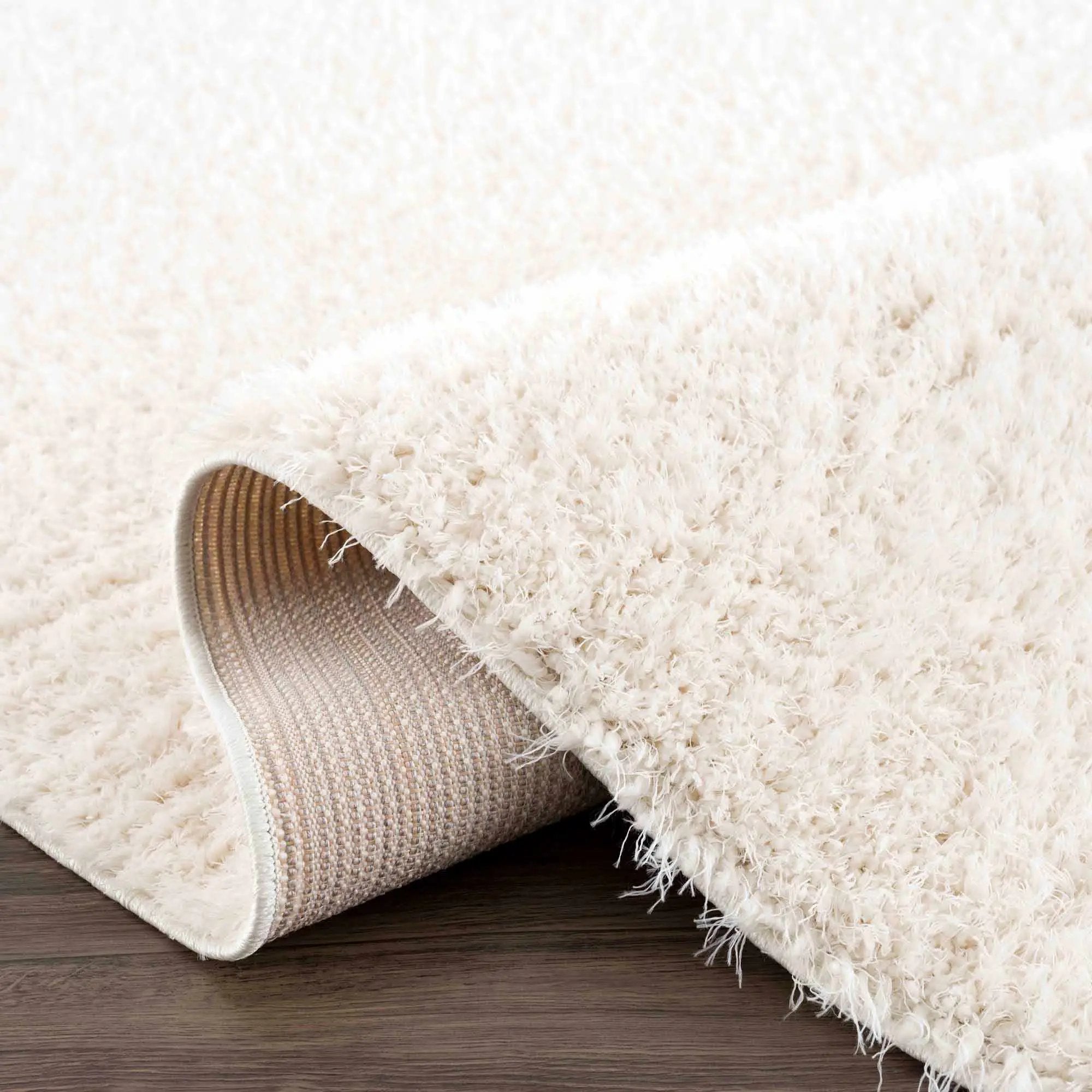Faina Solid Cream Shag Washable Area Rug - Clearance by Boutique Rugs