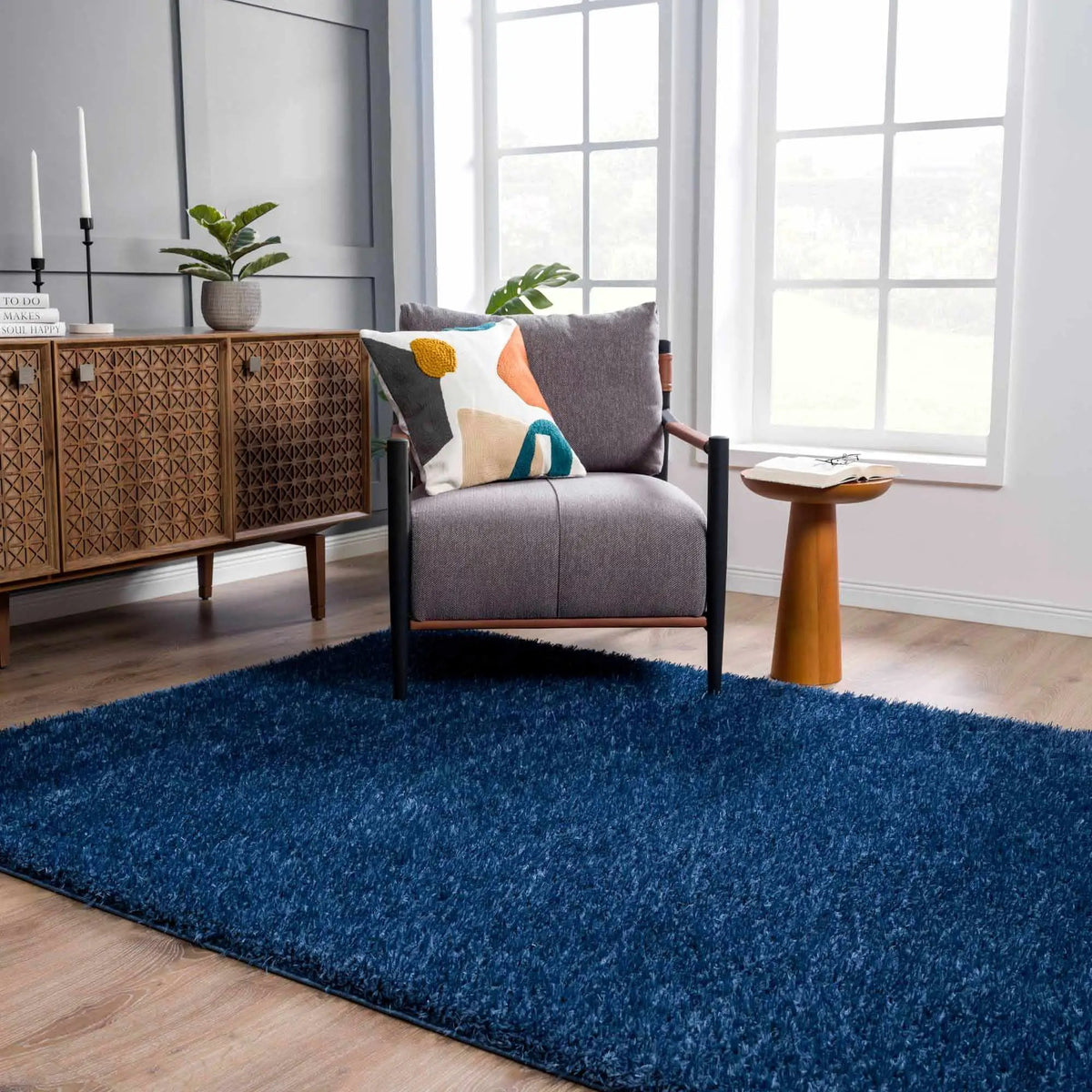 Faina Solid Dark Blue Shag Washable Area Rug - Clearance, installed in a room